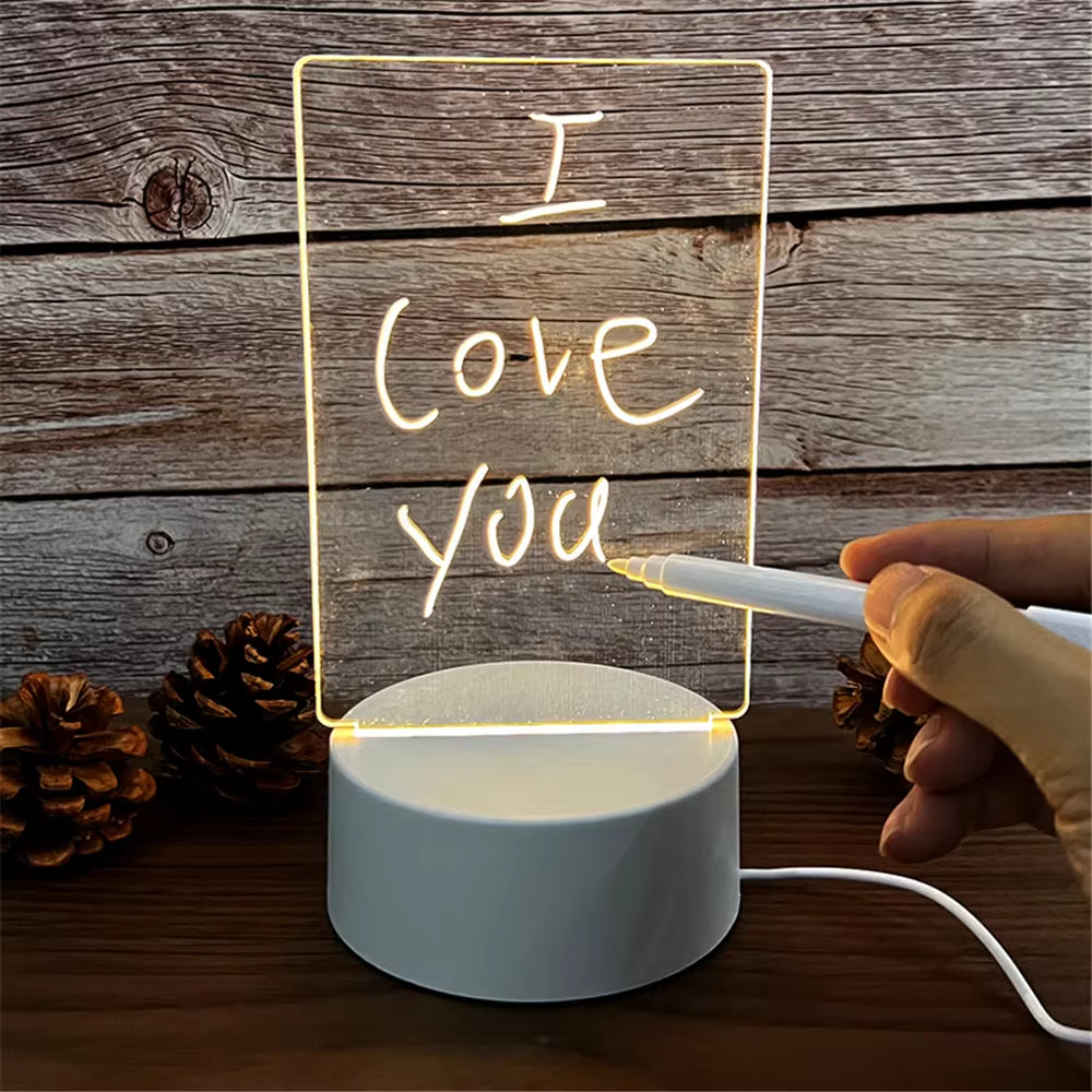 Transparent luminous LED night light with erasable acrylic message board on white USB-powered base