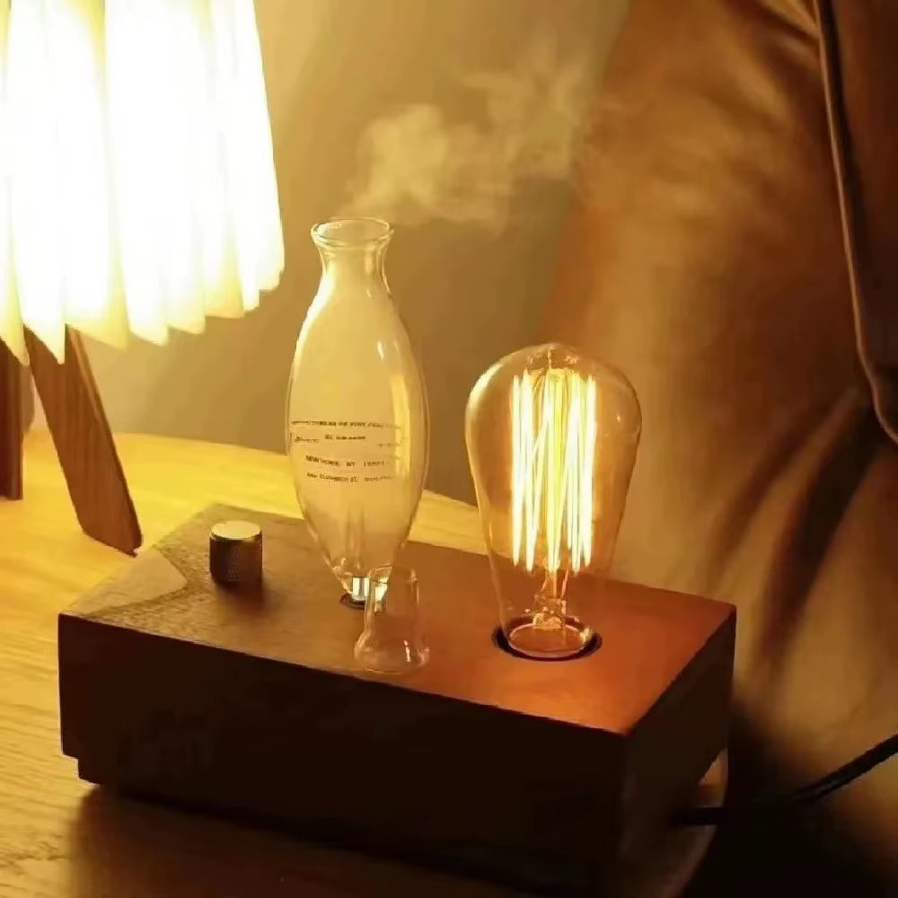 Vintage style aroma diffuser with tungsten filament lamp and wooden base emitting mist for aromatherapy